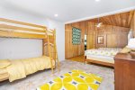 Guest room has flexible sleeping with 2 twins, a daybed with trundle, and a twin bunk bed